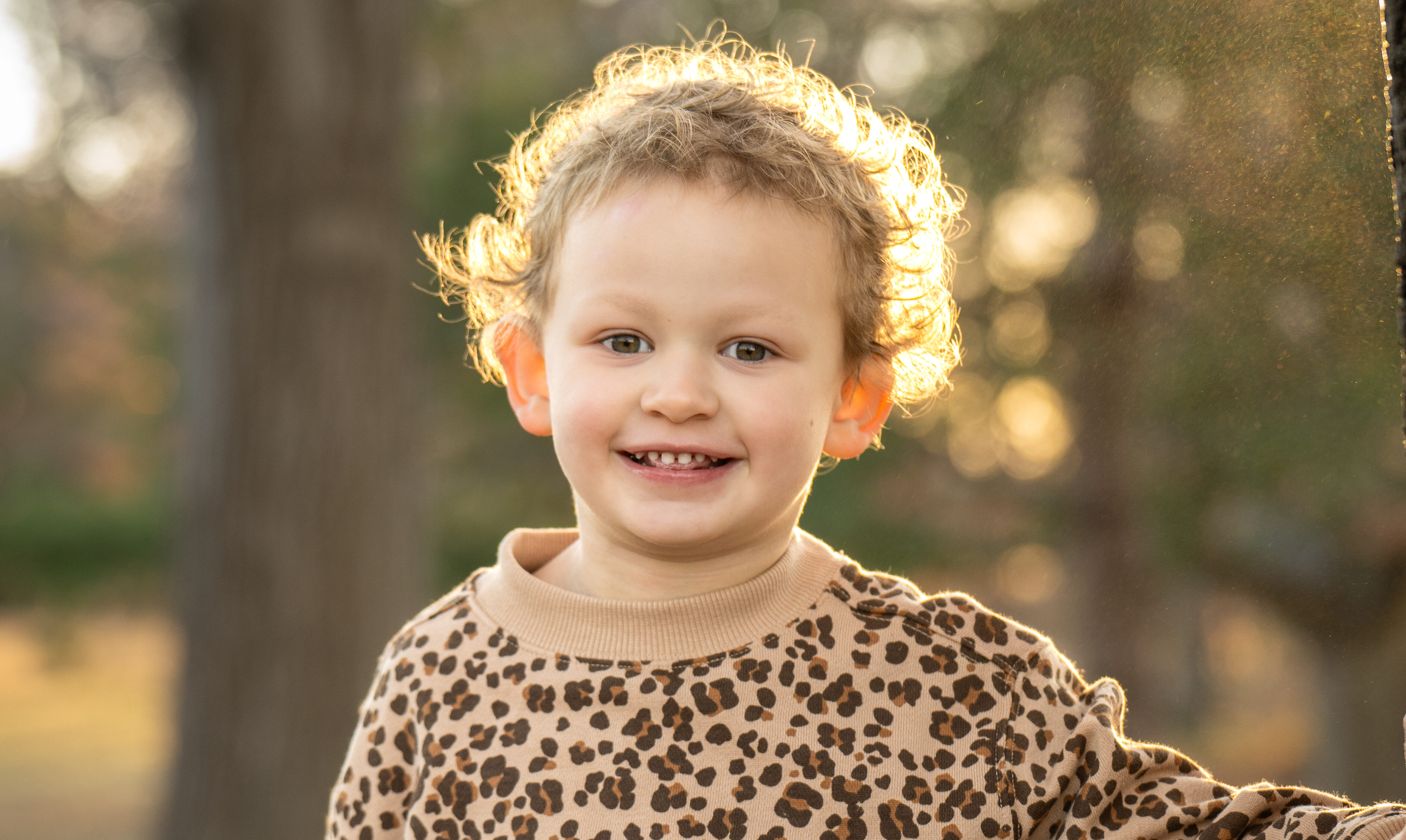 Little girls wearing a leopard print shirt